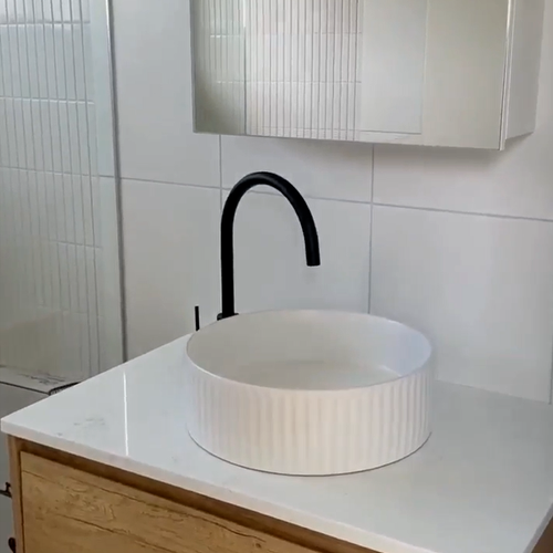 Ensuite-bathroom-Trembilt-black-hardware Master ensuite bathroom renovation in Warana by Trembuilt with neutral finishes and wood-look cabinetry
